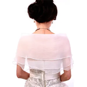 Elegant rear view detail of a white three-layer chiffon bridal shawl for wedding gowns