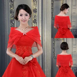Detailed view of red three-layer bubble gauze bridal shawl with bow buckle and curled edges