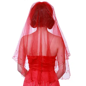 Elegant red bridal veil with crescent wavy edges and pearl details shown in back view