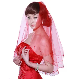 Elegant red mesh bridal veil featuring crescent edge and pearl beads for wedding parties