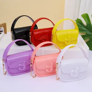 Mini borse in gelatina per bambini in vari colori vivaci con tracolla a catena d'oro