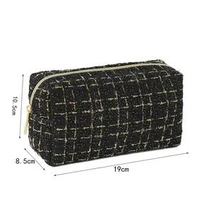 Classic black and gold tweed rectangular cosmetic bag with dimensions 19x8.5x10.5cm
