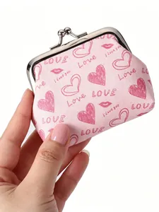 Adorable mini porte-monnaie rose à fermoir bisou avec motifs cœurs, tenu à main