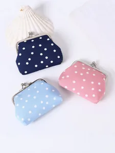 Drei süße gepunktete Münzbeutel in Marineblau, Rosa und Hellblau mit Clipverschluss im Set