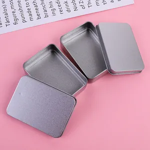 Set of small rectangular silver frosted tinplate boxes for storage and organization.