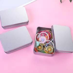 Frosted silver rectangular tin storage boxes for organizing jewelry and hair accessories