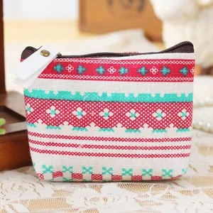 Detail view of the woven geometric pattern on the vintage linen coin purse