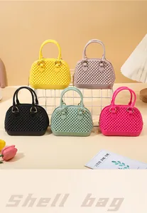 Collection of colorful mini PVC jelly shell handbags featuring unique woven texture