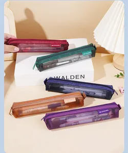 Detailed view of mini mesh pencil cases in vintage colors with zipper closure