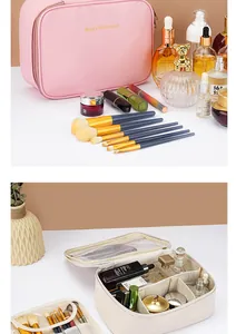 Interior view of large capacity waterproof makeup bag with dividers and cosmetic storage