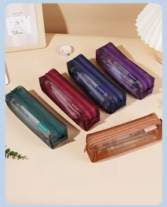 Selection of large capacity mesh pencil pouches in various retro colors for students