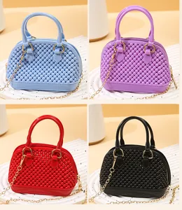 Mini PVC jelly shell bags available in four vibrant colors featuring textured bead finish and chain