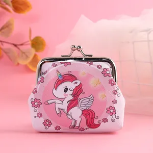 Close-up of a pink unicorn cartoon coin purse with a vintage metal kiss-lock clasp