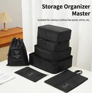 7-piece black travel storage organizer bag set for clothes and makeup accessories