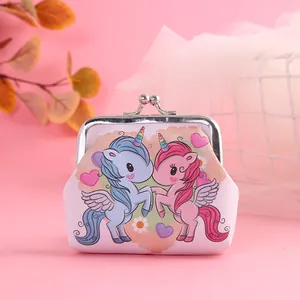 Detailed close-up view of a cute cartoon unicorn print on a pink mini coin purse with metal clasp