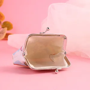 Close-up detail of the open interior and metal clasp of a cute cartoon unicorn coin purse
