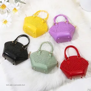 Farbenfrohe Mini-Gelee-Muschel-Handtaschen für Kinder und Frauen mit modischem Lochmuster