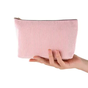 Große rosa Cord Kosmetiktasche mit Reißverschluss für Make-up und Toilettenartikel.