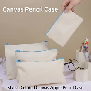 Set of blank canvas zipper pencil bags for DIY painting and stationery storage organizer.