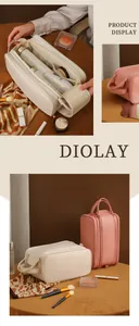 Detail of a large-capacity leather makeup bag with compartments for cosmetics and toiletries.