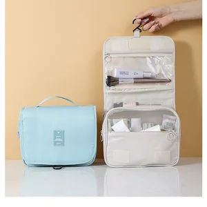 Borsa da toilette da viaggio appendibile e organizer per trucco in blu e beige per donne