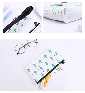 Detail view of canvas pencil case with cactus print and black zipper closure