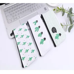 Macro detail of high-quality canvas pencil cases featuring cute cactus prints for students.
