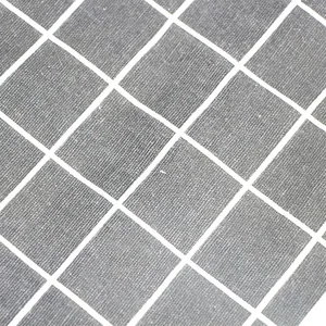 Gray and white grid pattern cotton linen fabric texture detail of Japanese tissue box