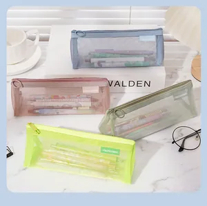 Collection of mesh triangular pencil cases in pastel colors for school and office