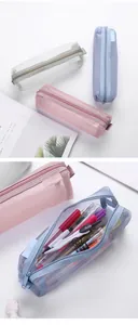Close-up detail of thickened mesh pencil bag showing its spacious storage capacity