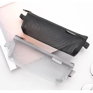 Close-up of minimalist black and silver mesh pencil cases showing breathable texture