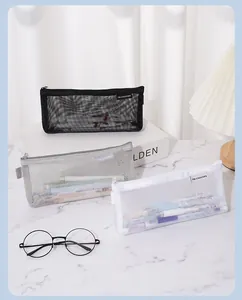 Set van mesh etuis inclusief zwarte, grijze en witte transparante nylon pennenzakken.