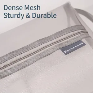 Minimalist gray nylon mesh storage bag with durable zipper and label detail