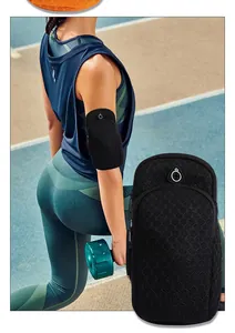 Close-up of breathable black mesh running phone armband with earphone hole detail