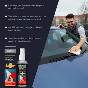 Detailed view of Rayhong car glue remover spray with a person cleaning a blue car hood
