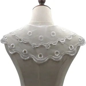 Macro view of white double-layered embroidered organza lace fake collar on mannequin