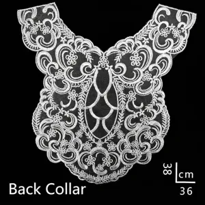 Detailed view of white embroidered lace back neckline applique with 38x36cm dimensions.