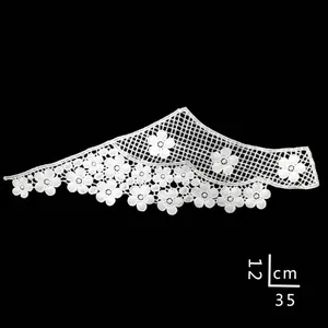 Detailed view of white water-soluble lace floral embroidery applique for DIY sewing.