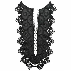 Detailed view of black heavy embroidered water-soluble lace collar with leather patches