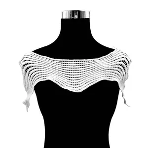 Close-up of white water-soluble lace collar with intricate wave hollow embroidery