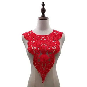 Detail shot of elegant red water-soluble lace collar on a mannequin for DIY sewing