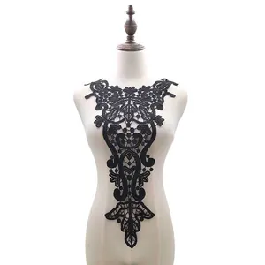 Detailed view of a black water-soluble lace collar with 3D hollow embroidery design