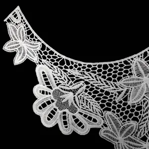 Detailed view of white water-soluble milk silk embroidered lace collar with floral patterns.