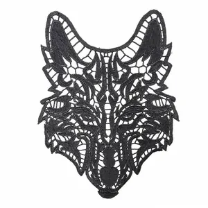 Macro view of black water-soluble lace fox head embroidery patch for DIY clothing