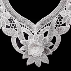 Close-up of white water-soluble lace collar with 3D floral embroidery for DIY sewing.
