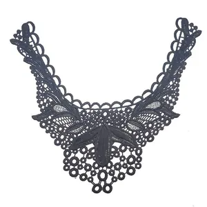 Detailed view of black water-soluble lace false collar with milk silk embroidery