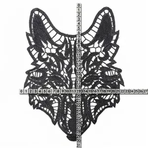 Detailed view of a black wolf head embroidered lace patch with 31x27cm scale measurements