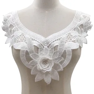 Detail view of elegant white water-soluble lace floral collar applique for DIY crafts.