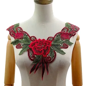 Detailed embroidery of red rose floral lace collar applique on a mannequin