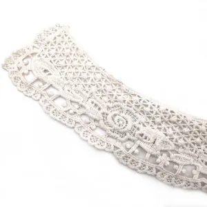 Detailed view of intricate white water-soluble cotton lace embroidery for elegant collars